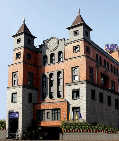Hotel De Grand Kozhikode Bagian luar foto